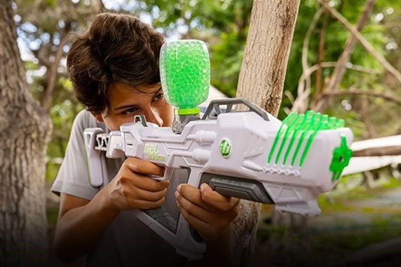 A kid enjoying laser tag on the weekend